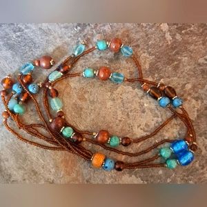 Collection of two handmade necklace and five pairs of earrings. Seed beads.